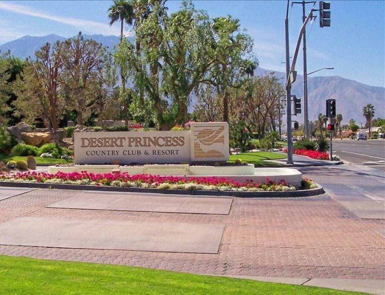 Desert Princess Country Club entrance sign and flower beds