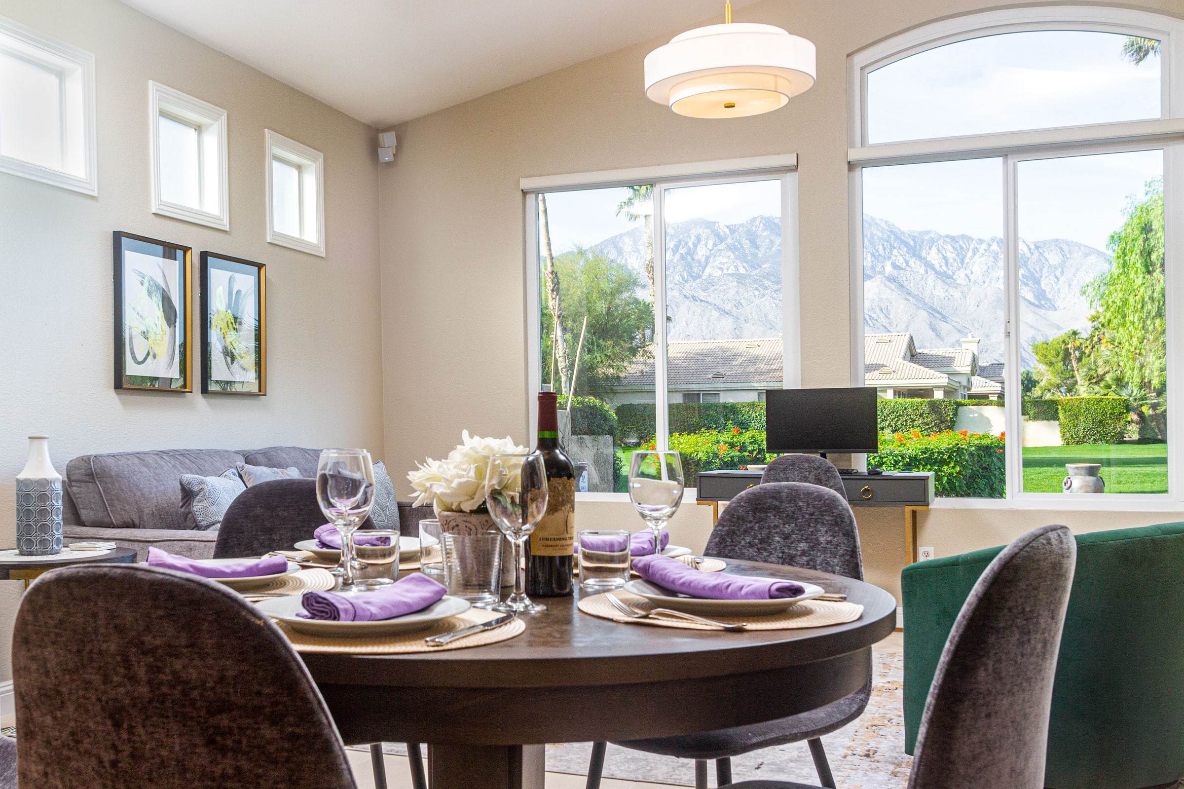 Dining nook table beside an arched window