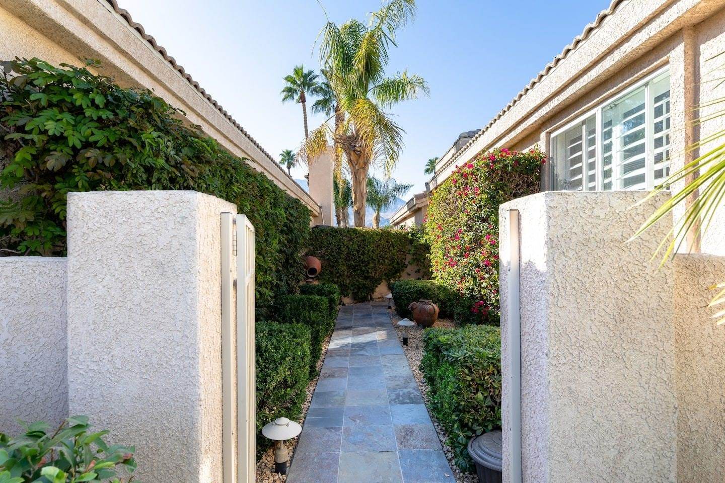 Gate and slate path to the front door